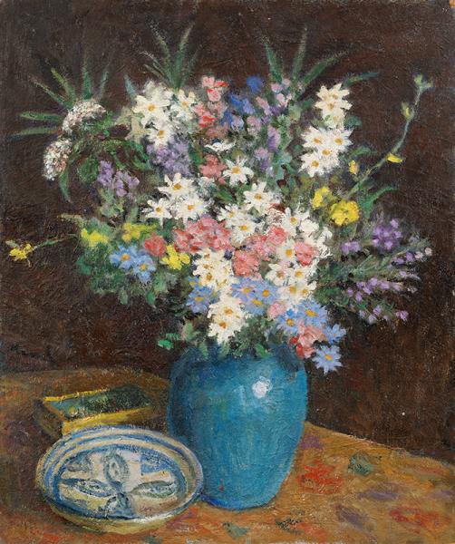Bouquet de fleurs au vase bleu